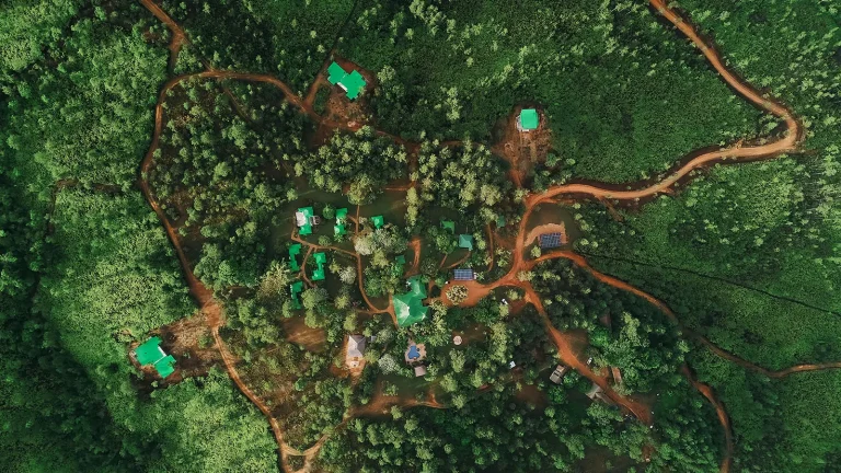 aerial shot of eco lodge in belize surrounded by nature