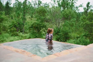 kid in kid friendly pool belize eco lodge